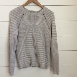 The limited grey and white sweater with zipper